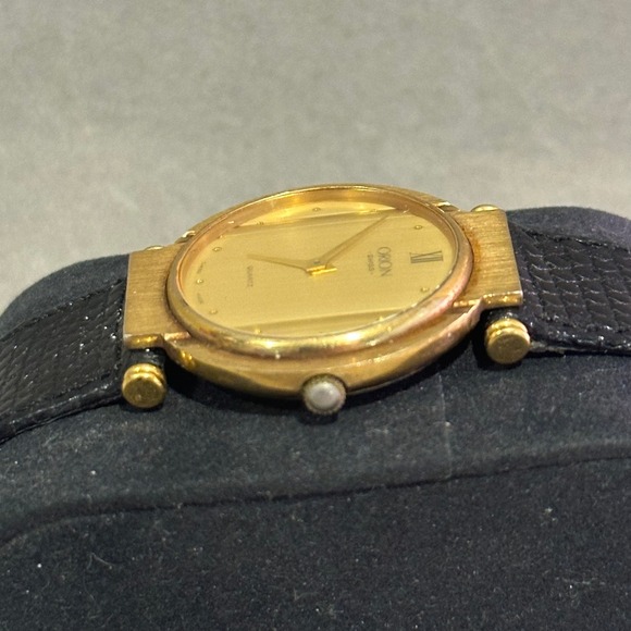 Orion Swiss Quartz Watch Gold Tone Champagne Dial Black Leather Gucci Buckle main image 9